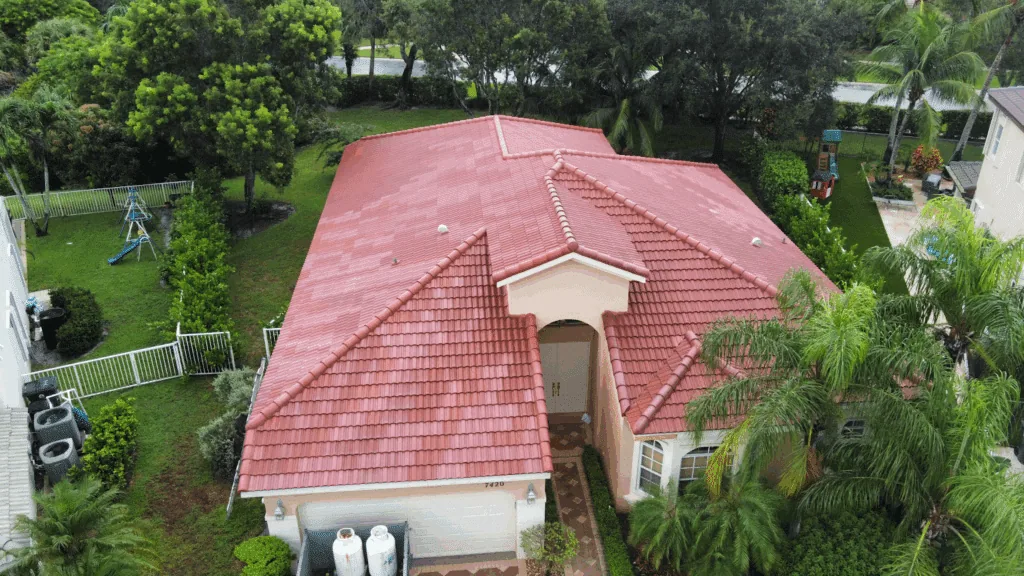front elevation red s tile roof arched entry garage greenacres lake worth