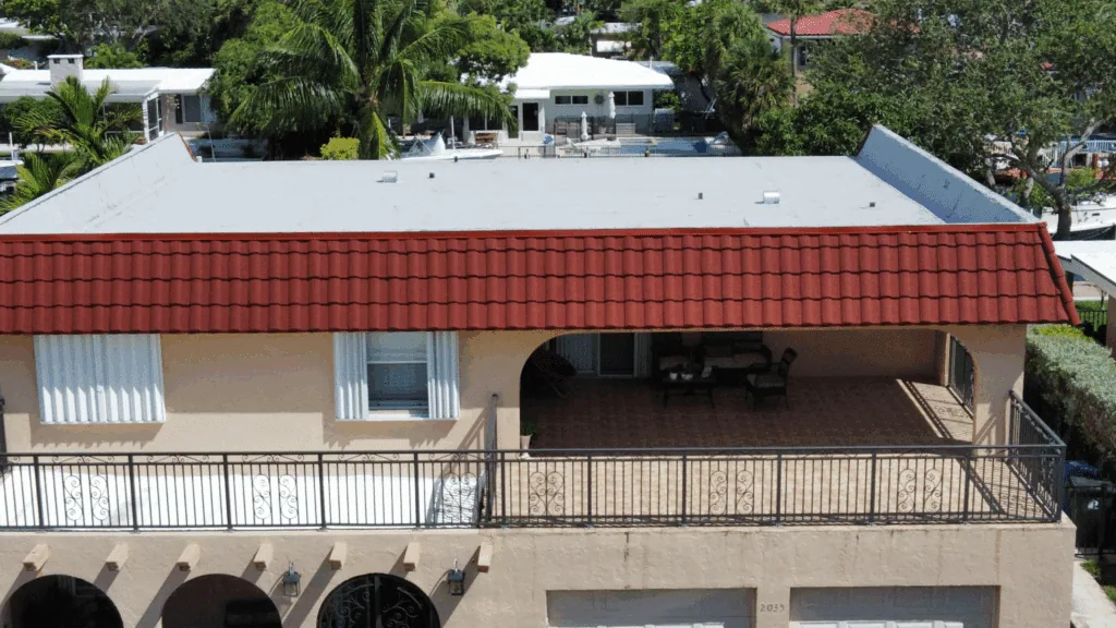 front elevation red tile eave gray flat roof covered balcony greenacres lake worth